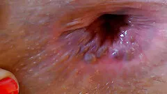 Fabulous blonde with big tits toying with anal insertions