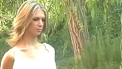 Stunning MILF gets naked outdoors and teases her pussy