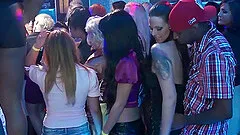 Some captivating chicks blow and get fucked in a club