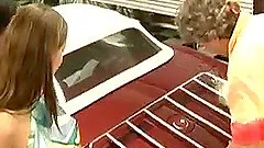 Heavenly lesbians with natural tits enjoy fucking in expensive car