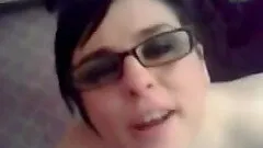 Chubby brunette bitch wearing glasses gives a blowjob in homemade POV