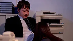 Attractive Japanese dame giving superb blowjob in the office in close up shoot