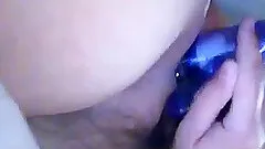 Homemade solo with a chick enjoying a raunchy moment with a dildo