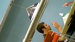 Slim chick wearing a miniskirt gets caught on voyeur's cam at a cafe