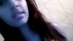 Nasty brunette girl flashes her shaved pussy for the webcam