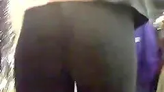 Slim chick wearing legging gets caught on voyeur's cam