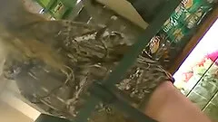 Amateur chick gets caught on voyeur's cam in a public place