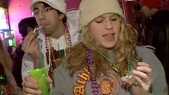 Sexy chick with a hot body flashing her big tits at partygoers