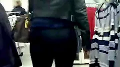 Big-assed chick wearing legging caught on camera in a shop