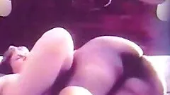 Blurry homemade video of a chubby couple fucking on a bed