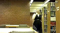 Tattooed amateur blonde in glasses flashes her small tits