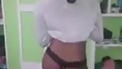 Amateur girl wearing thong shakes her butt in front of a cam