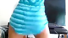 Amateur girl wearing a minidress shakes her butt in front of a webcam
