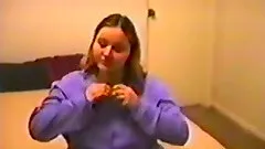 Brown-haired BBW strips and plays with her big boobs and cunt