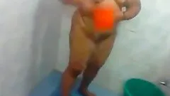 Chubby dark-haired hussy takes a shower in homemade clip