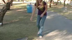 Affectionate blonde in jeans skating lovely in reality shoot outdoor