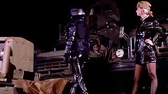 Horny Lesbians in leather uniform lick each other nicely outdoor