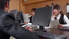 A Japanese couple stays late at the office and fucks