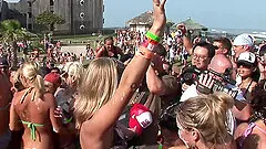 Party girls get topless and dance at a wild outdoor party