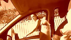 A dude jerks his dick off in a car and lets people watch him
