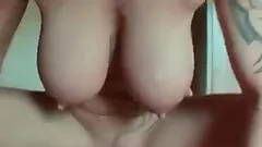 Busty tattooed short-haired mom rides a prick in homemade clip