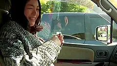 Japanese milf blows in a park and gets her cunt fingered