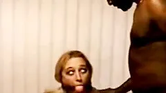 Salacious blonde enjoys a facial after ardent interracial sex