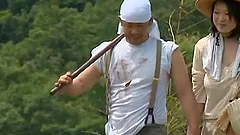 Japanese farmer fucks his wife in the fields in reality clip
