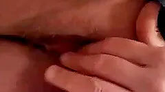 Close up solo video of a chick fingering her shaved snatch