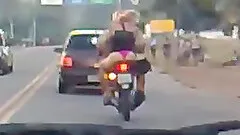 Hussy in thong riding a bike gets caught on a dash cam
