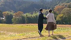 Japanese milf gets fucked in the fields in reality video