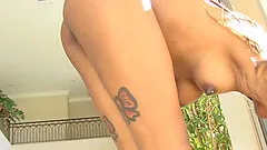 Beautiful Ebony-Skinned Girl With A Sexy Tattooed Body Playing With A Vibrator