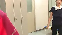 Two busty moms play with a nerd's cock in the locker room