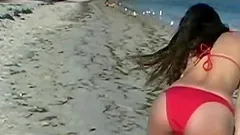 Fantastic Brunette Serves A Tasty Blowjob On The Beach