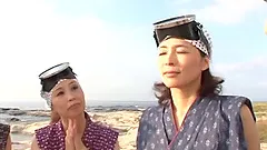 Five nasty Japanese MILFs suck and stroke a cock outdoors