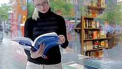 A cute babe in glasses has a sensual sex by a nerdy guy