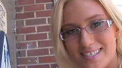 A cute White chick in glasses sucks and rides a BBC in a gloryhole clip