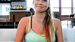 Sporty blonde Courtney shows her boobs and ass in the yard