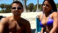 Spicy Latina wants to ride her man on the sands of a beach
