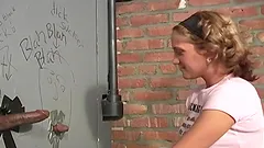 Petite White chick gets spit roasted by Blacks in a toilet