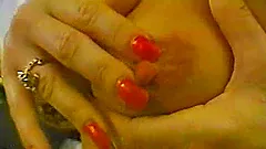 Filthy mature lady is pleasing herself with a toy