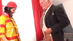Brunette chick in firefighter uniform gets fucked by old man