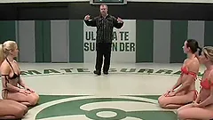 Four horny chicks fight in a ring and lick pussies in public