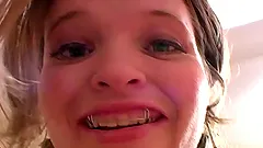 That nerdy girl is showing her handjob skills on a dildo