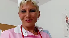 Eager head practical nurse playing with herself in her uniform