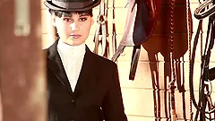 Sexy jockey gets naked and starts showing her shapes