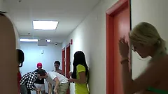Two slutty students get fucked by two dudes in a dorm's hall