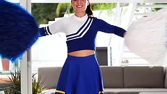 Stunning Gigi Marie poses in cheerleader uniform