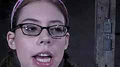 Skinny teen in glasses gets humiliated in a basement