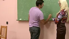 Blonde teacher Leah Lush enjoys a gangbang in a college room